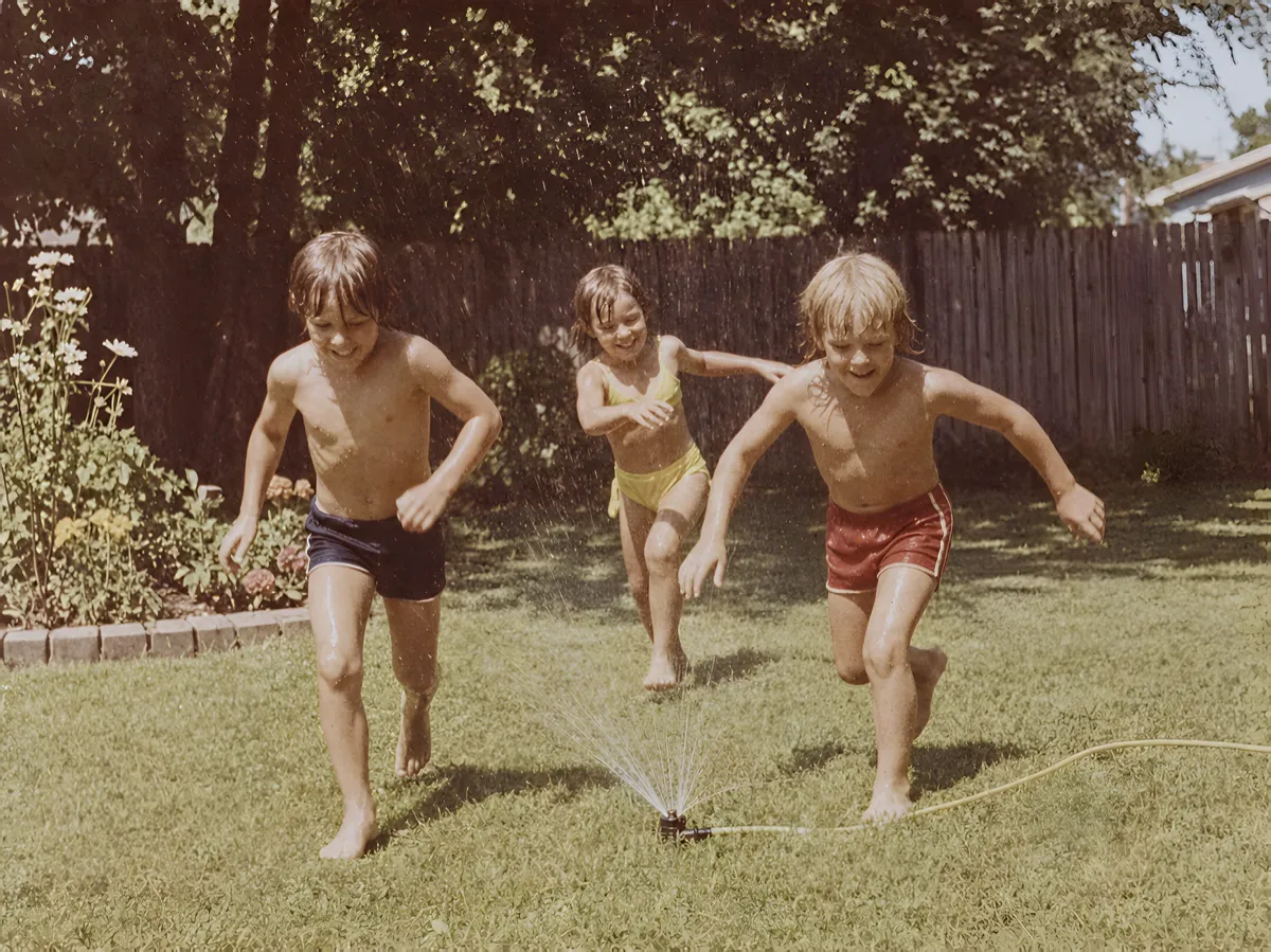 After restoration in the app: the same photo, clearer with less yellow cast